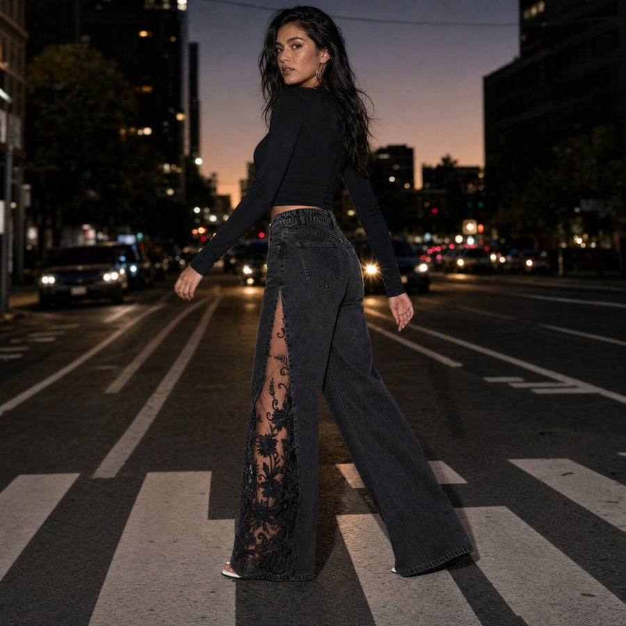 Black lace slit jeans mid-stride